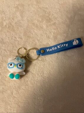 Hello Kitty Blue Silicone Strap Keychain with White Character Charm